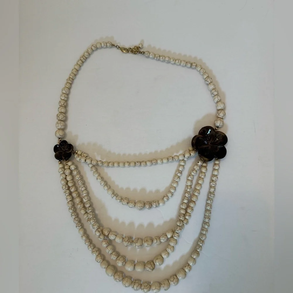 Gorgeous earth tone beaded necklace with brown floral accents